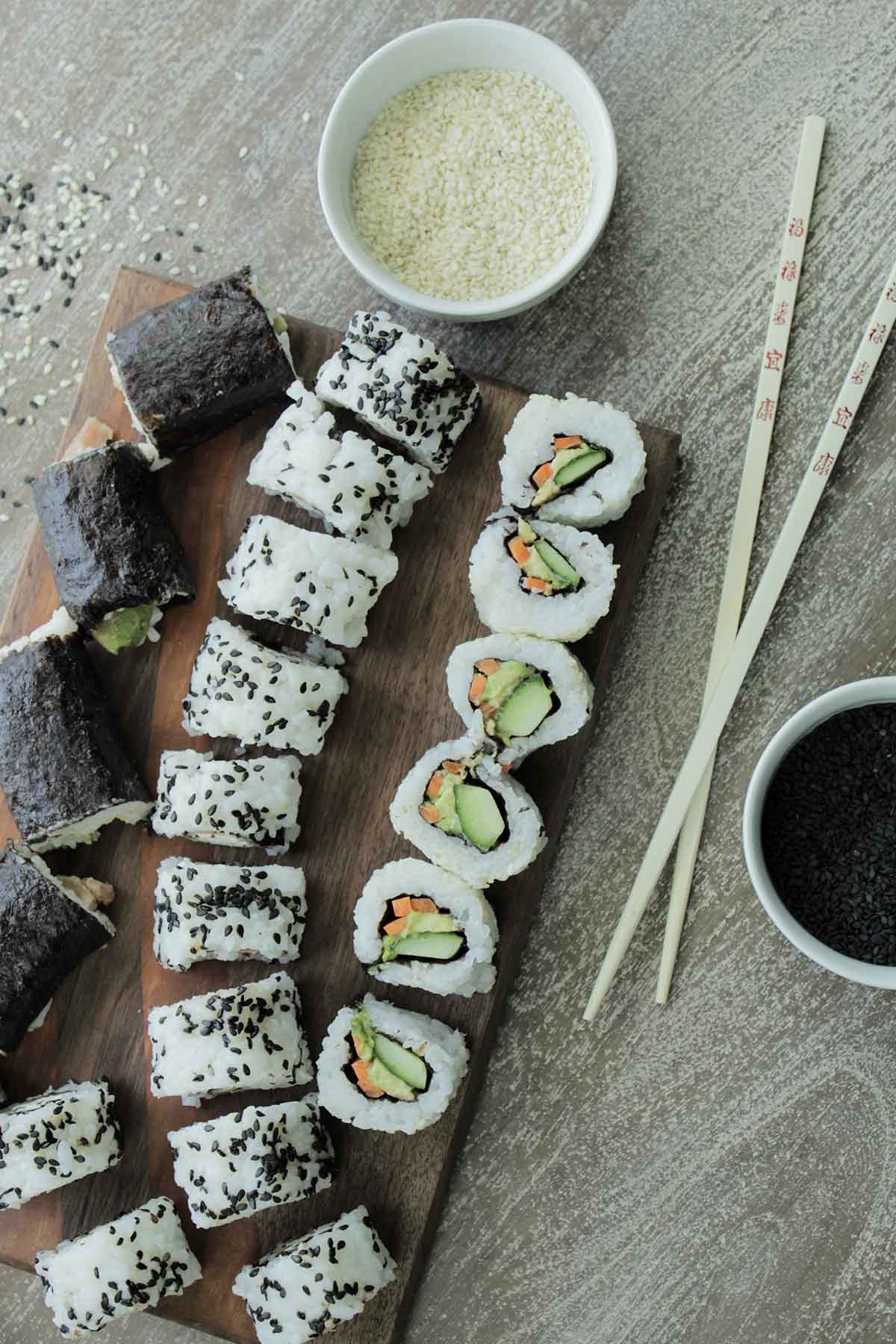 https://homebodyeats.com/wp-content/uploads/2023/01/finished-sushi-rolls-on-platter.jpg