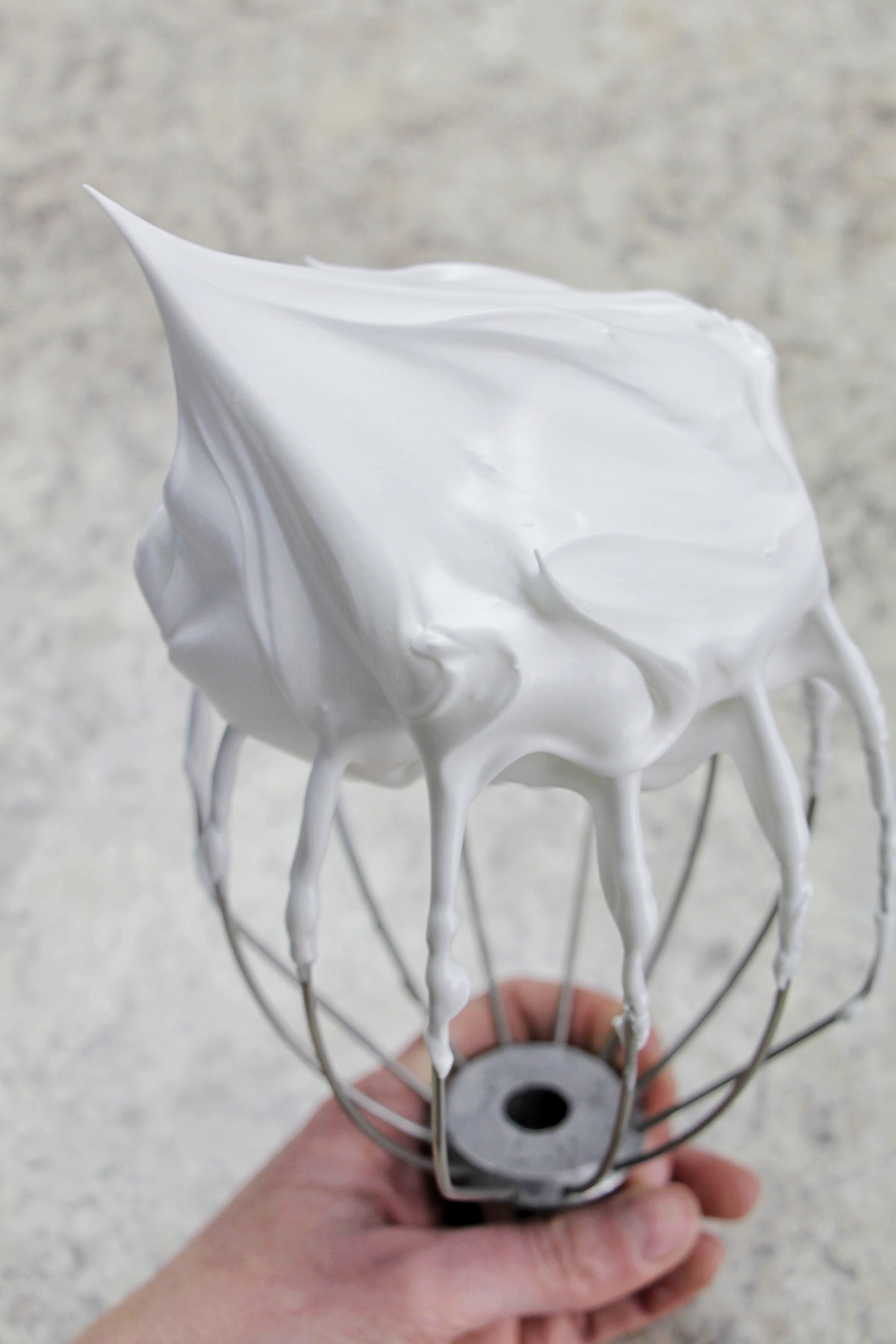 stiff meringue on a stand mixer whisk attachment.