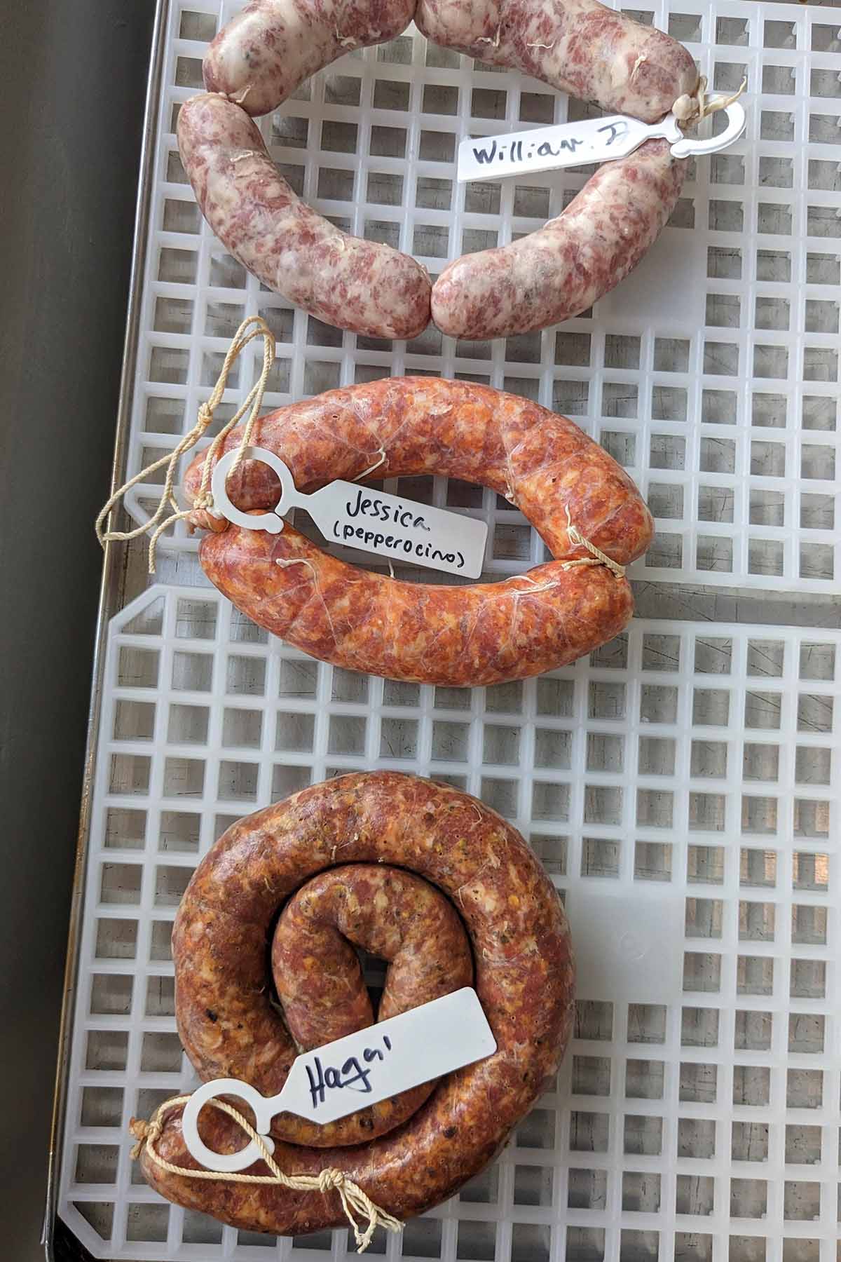 three handmade sausages.