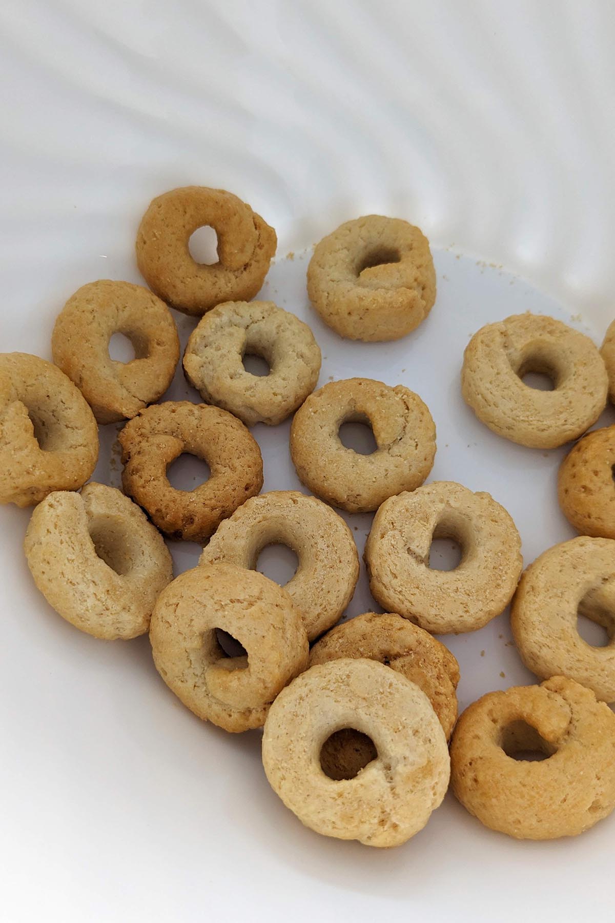 circular crackers in a white bowl.