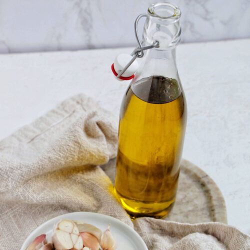 garlic olive oil in a glass jar.