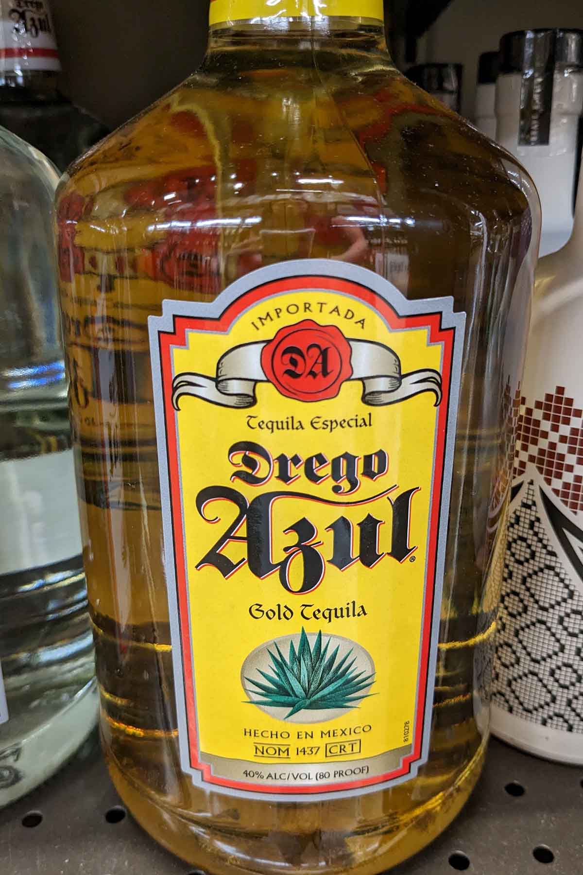 bottle of Drego Azul gold tequila.