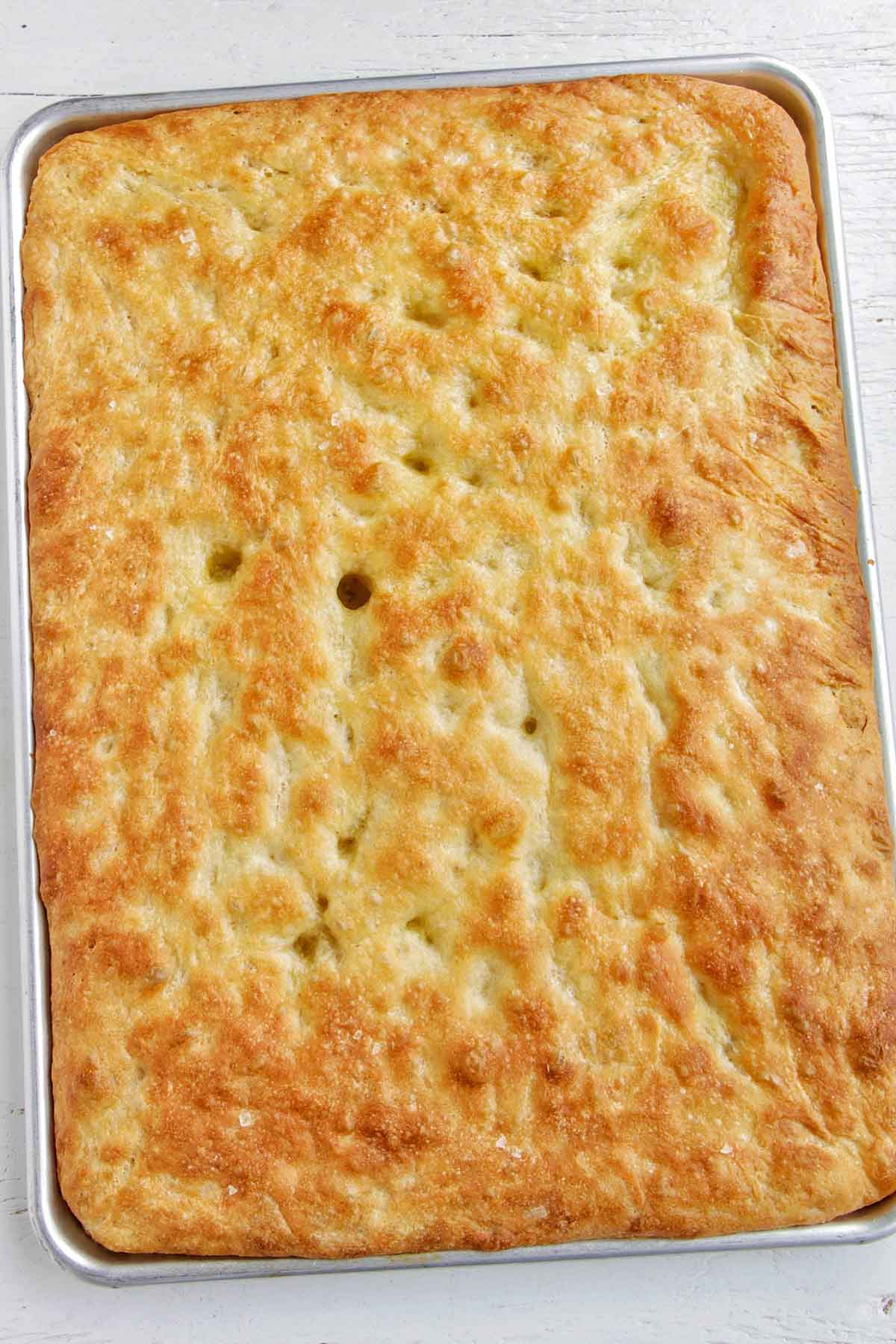 pan of baked focaccia bread.