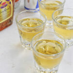 four Vegas bomb shots in rocks glasses.