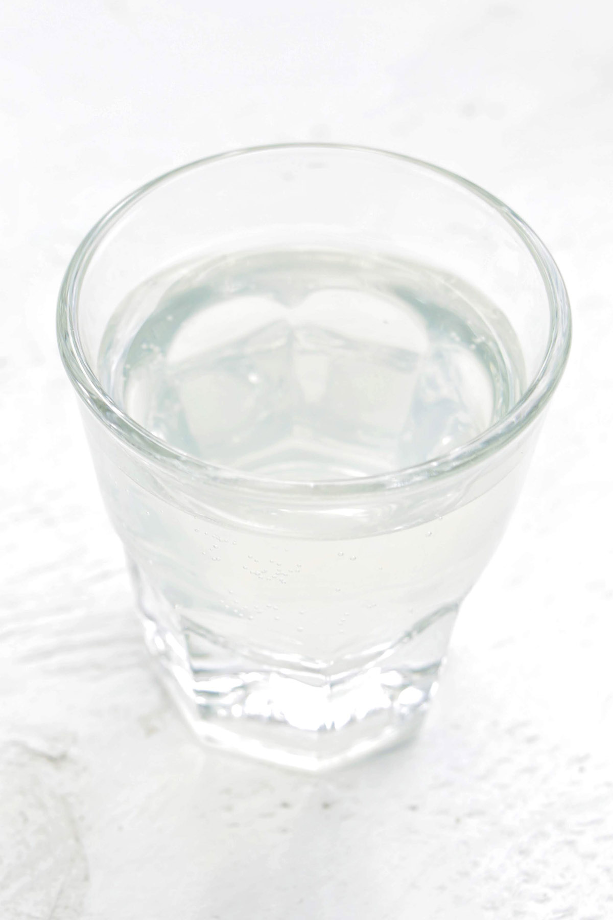 white tea shot in a rocks glass.
