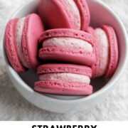 pink macarons filled with strawberry buttercream filling with text overlay.