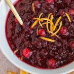 cranberry sauce in a white serving bowl.