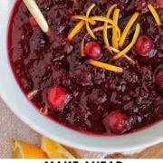 cranberry sauce garnished with orange peel with text overlay.