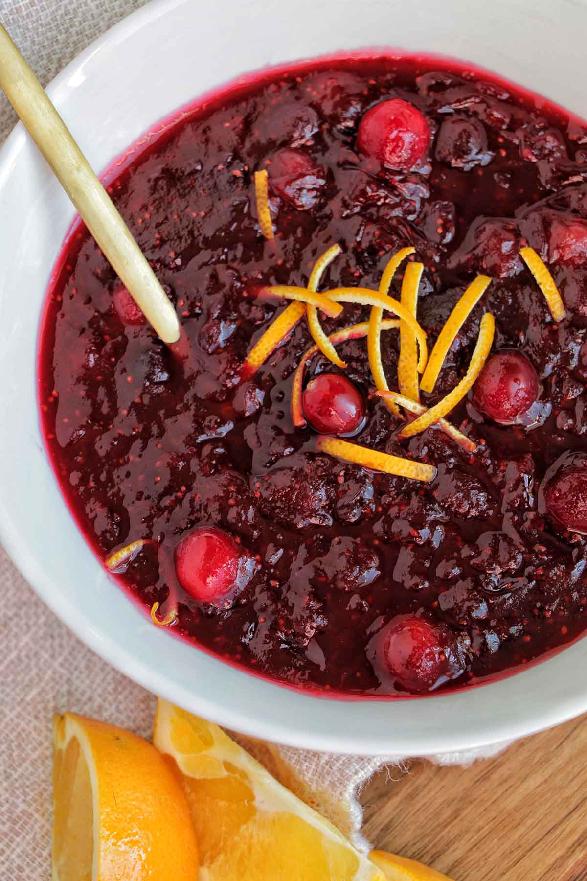 cranberry sauce in a white serving bowl.