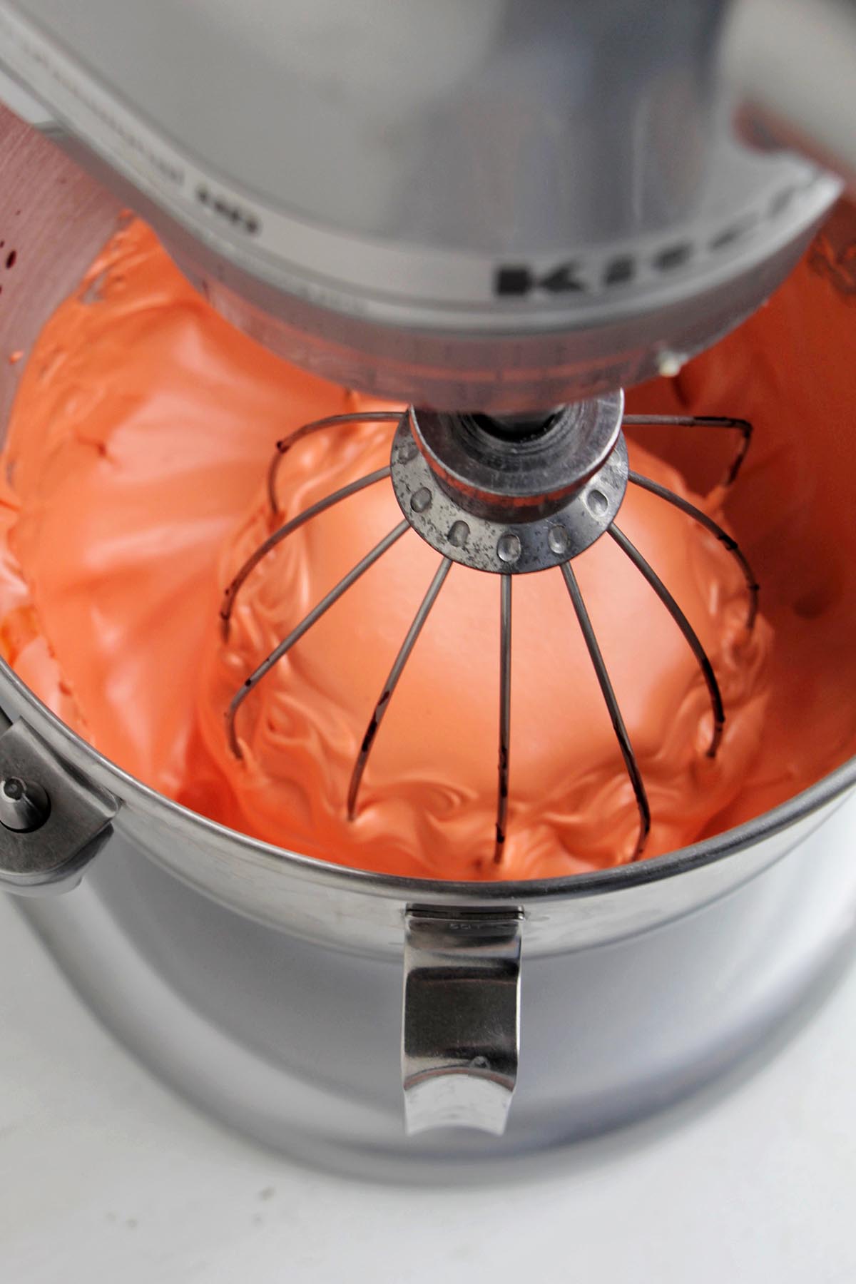 orange meringue in a KitchenAid mixer.