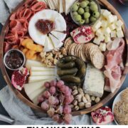 Thanksgiving cheese board with text overlay.