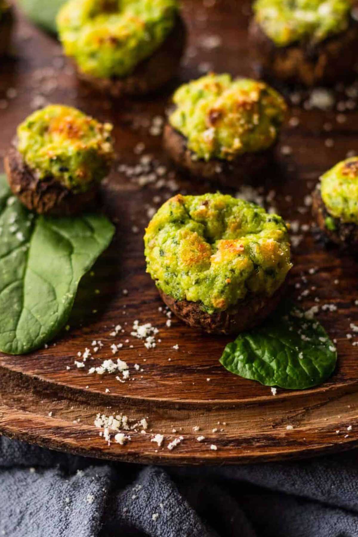 spinach stuffed mushrooms on a tray.