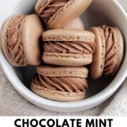 chocolate mint macarons in a bowl with text overaly.