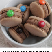 M&M macarons in a bowl with text overlay.