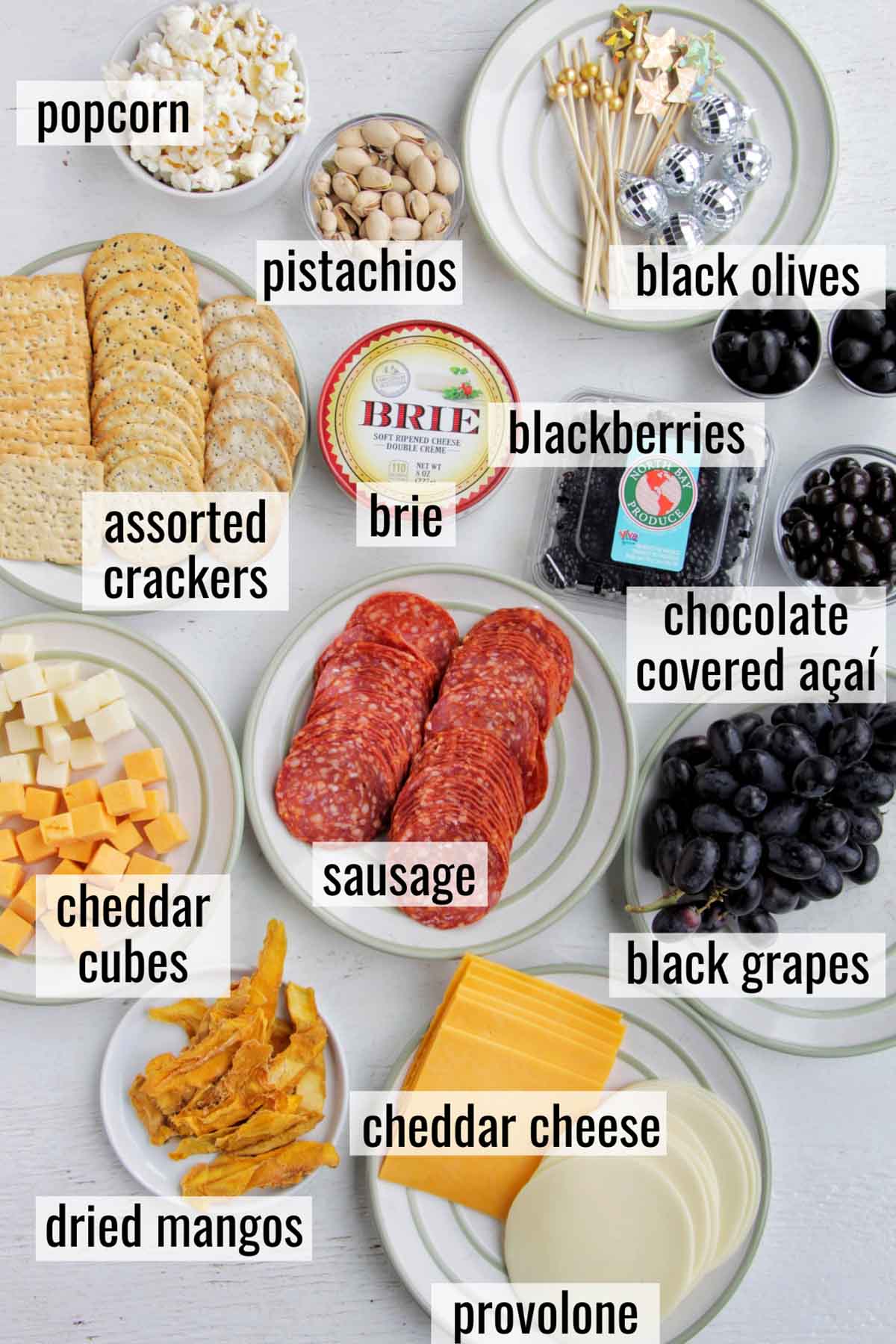 cheese board ingredients with labels.