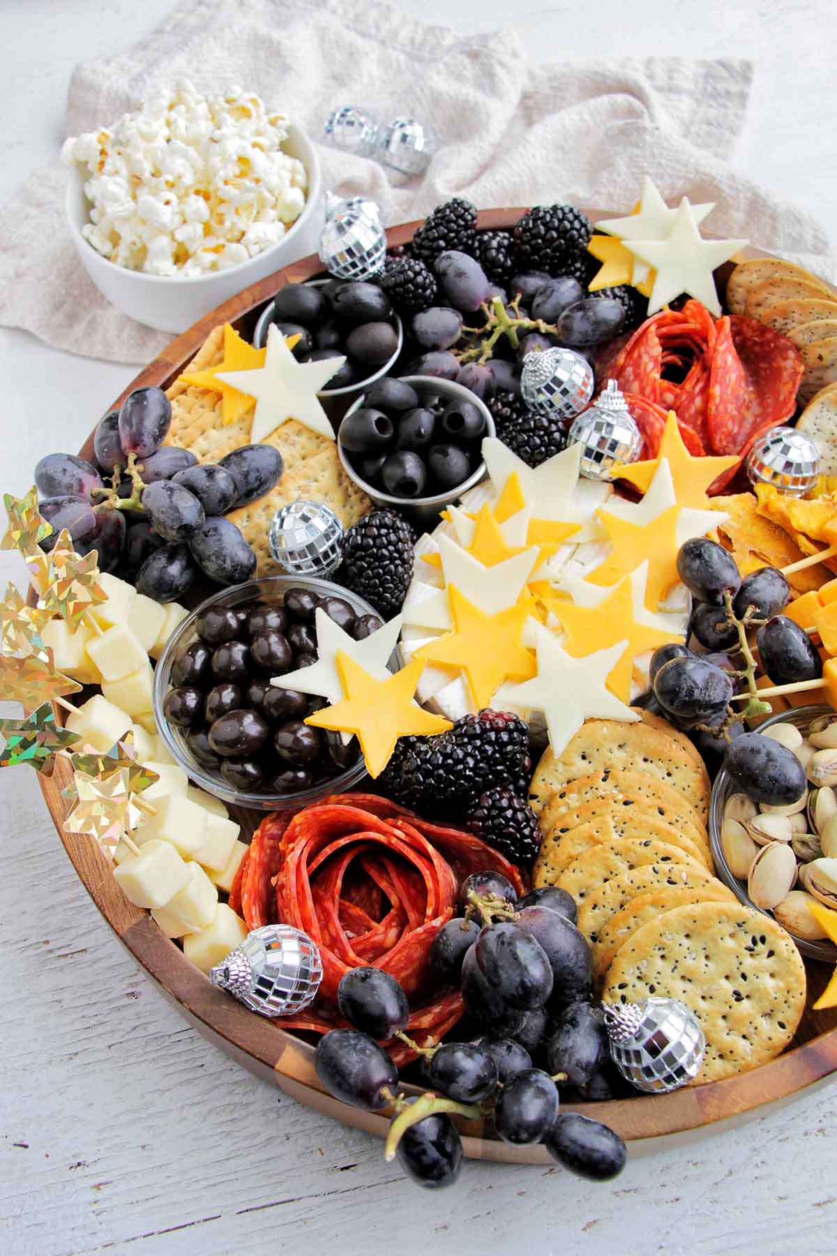 new years eve cheese board with star shaped cheese.