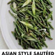 asian style green beans on a plate with text overlay.