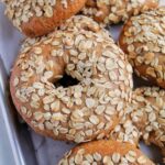 oatmeal bagels on sheet tray.