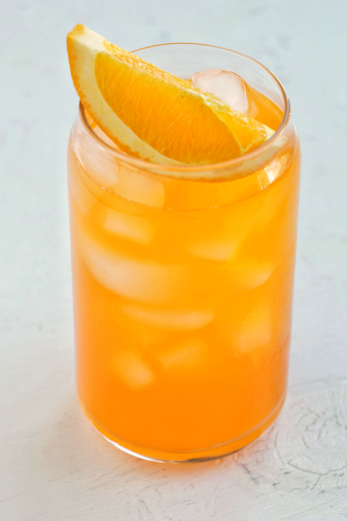 orange creamsicle drink with orange garnish.