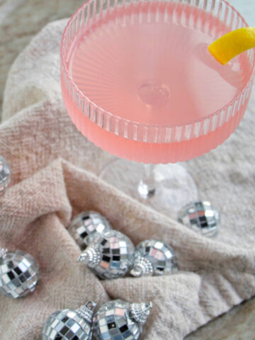 pink French blonde cocktail in a coupe glass.