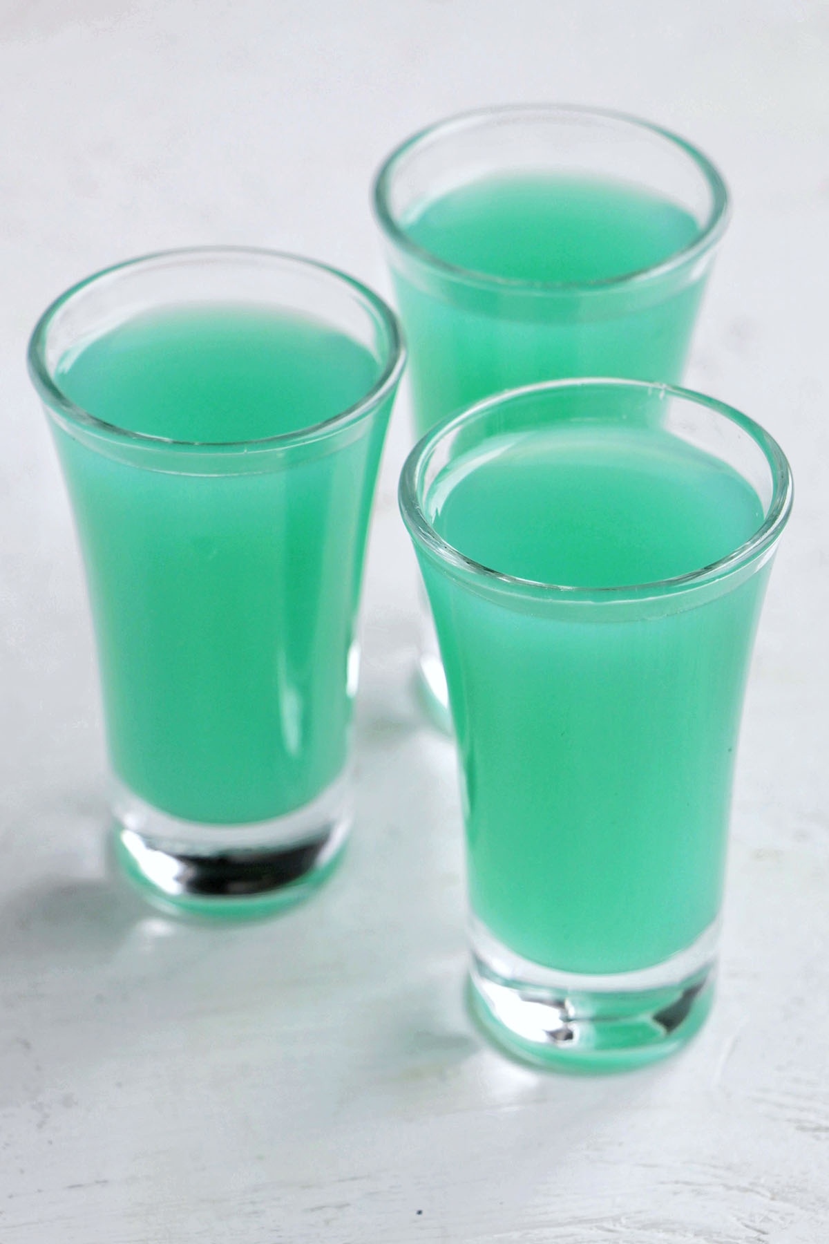 three blue tropical turquoise shots.
