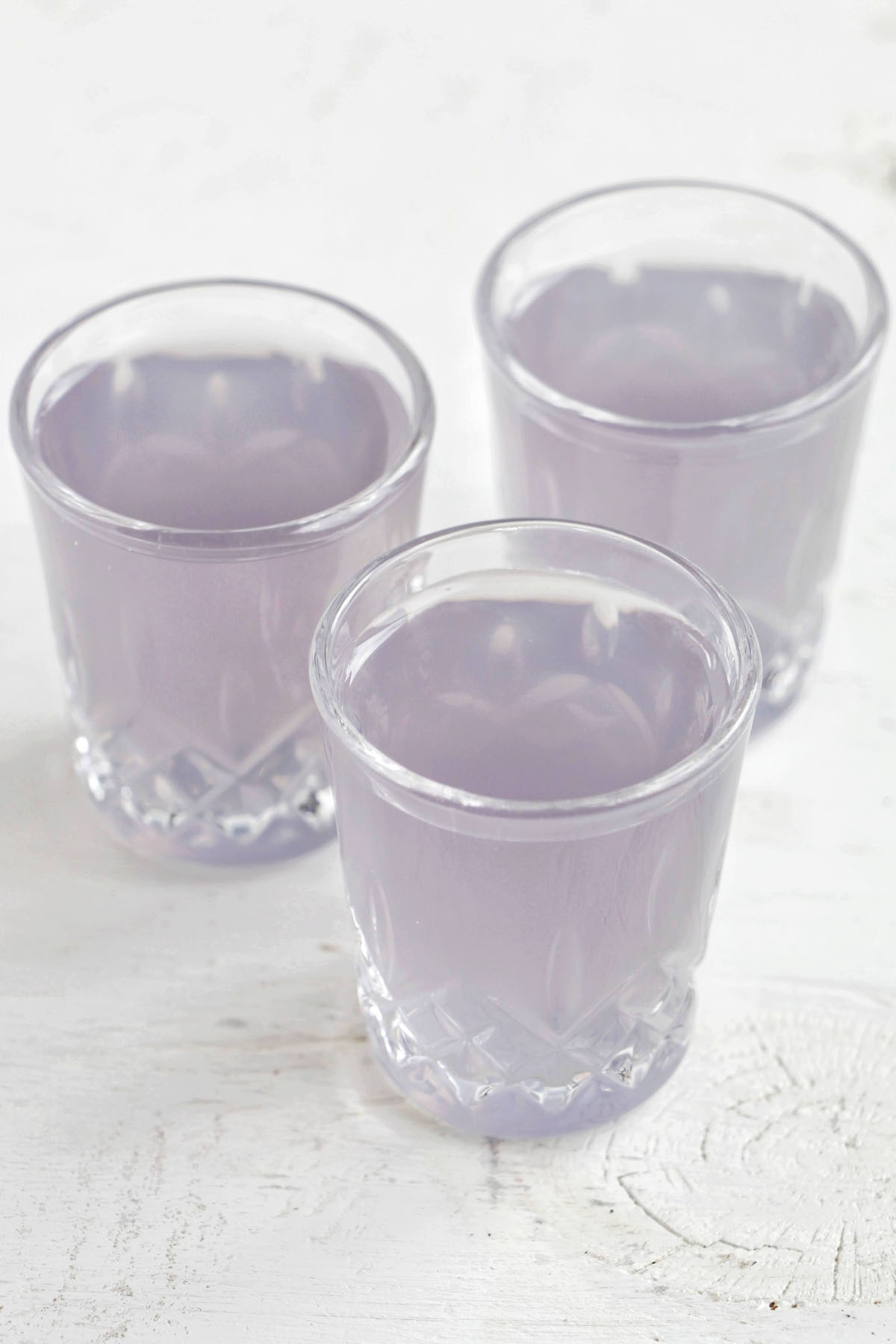 three violet peach shots.