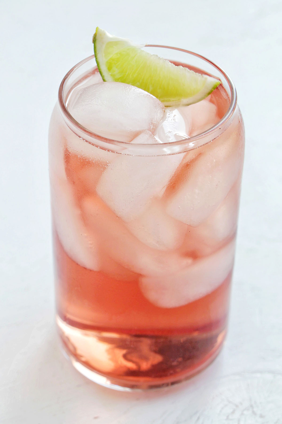 vodka cranberry with lime garnish.