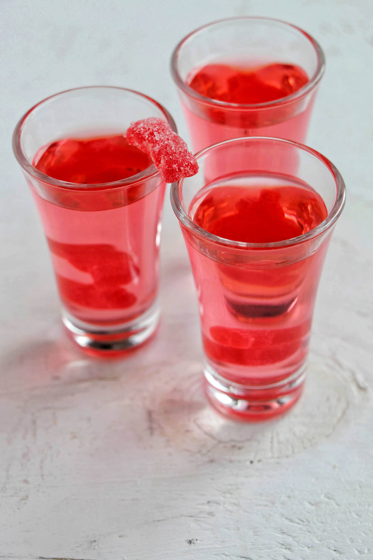 three watermelon pucker candy shots.