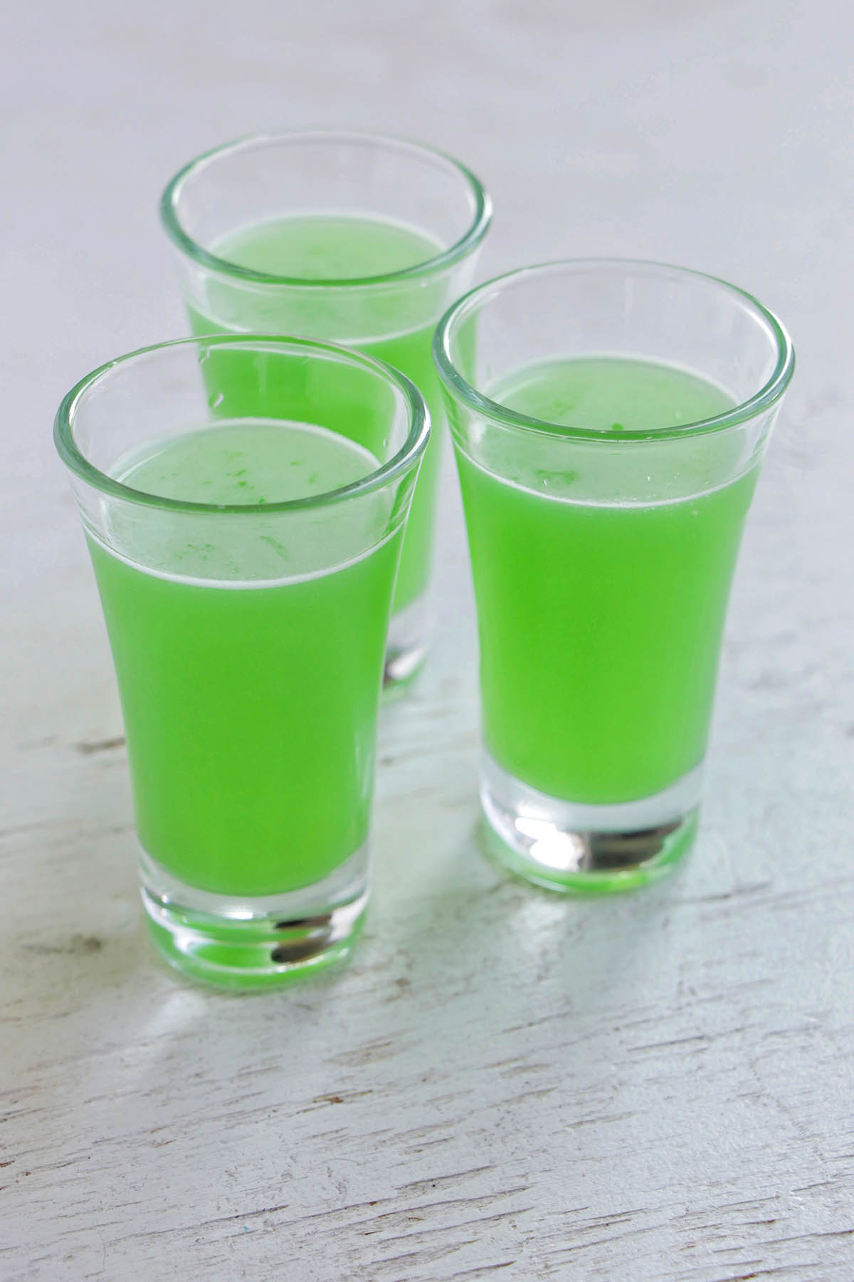 three green wicked witch punch shots.