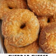 cheddar cheese bagels with text overlay.