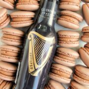 chocolate Guinness macarons with text overlay.