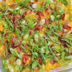loaded sweet potato casserole with toppings.