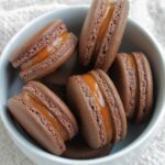beer macarons in a bowl.