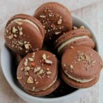 bourbon pecan macarons in a bowl.
