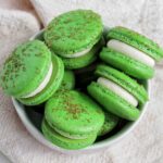 coconut lime macarons in a bowl.