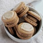 brown sugar Pop Tart macarons in a bowl.