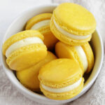 lemonade macarons in a bowl.