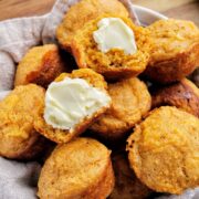 cheesy cornbread muffins in bowl.