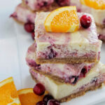 stacked cranberry cheesecake bars.