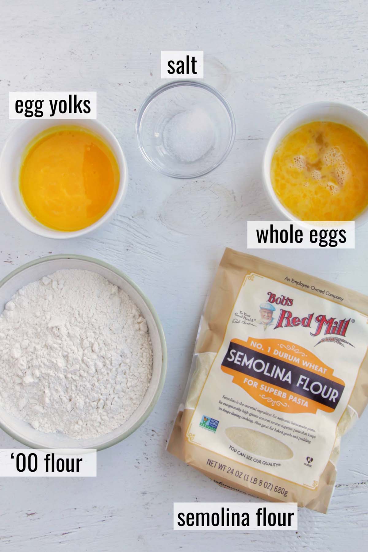 ingredients for Northern Italian egg pasta dough with labels.