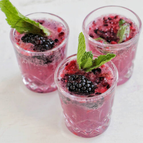 three mixed berry mojito shots.