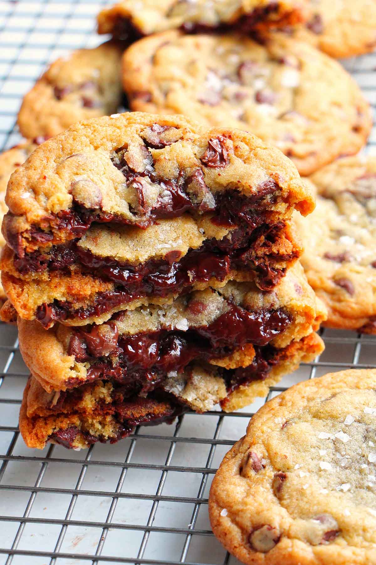 stack of hot fudge filled cookies on wire rack.