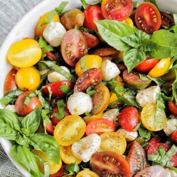 cherry tomato caprese salad in serving bowl.
