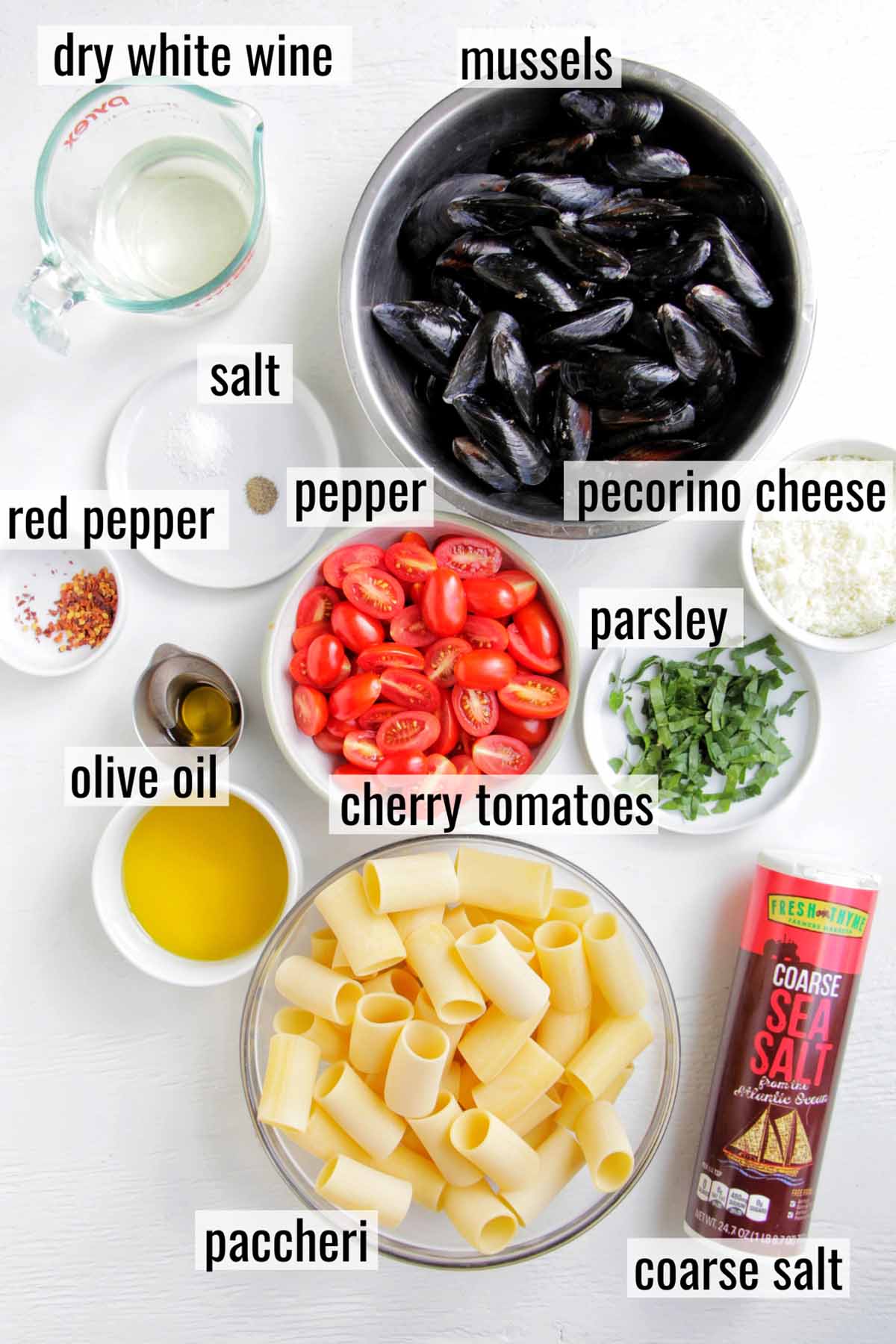 mussel tomato pasta ingredients with labels.