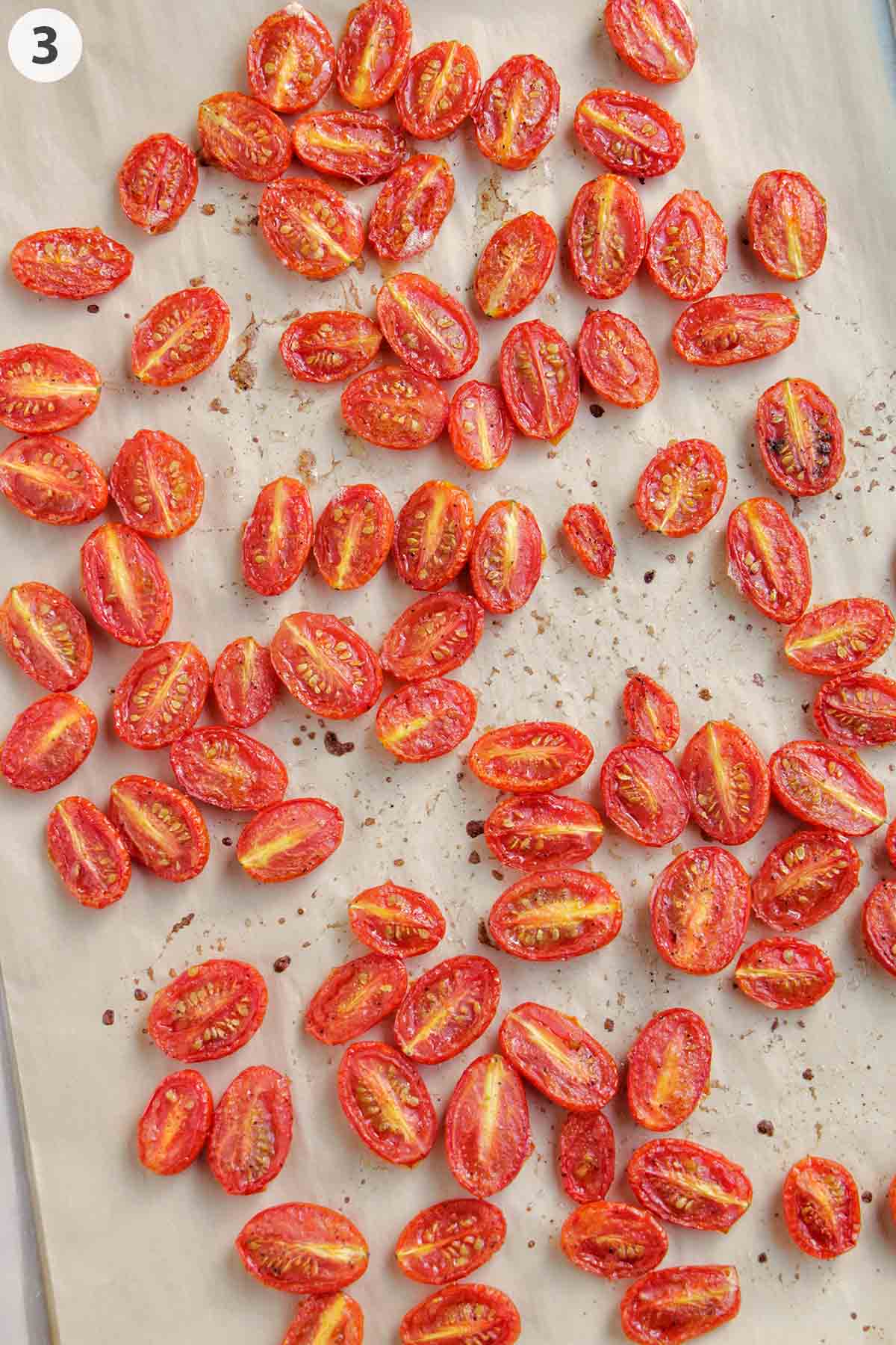 numbered photo showing candied cherry tomatoes on a parchment lined sheet tray.
