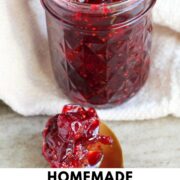 cranberry jam in a jar with text overlay.
