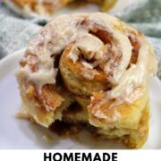frosted cinnamon rolls with text overlay.
