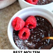 molted lava cake in a ramekin with raspberries with text overlay.