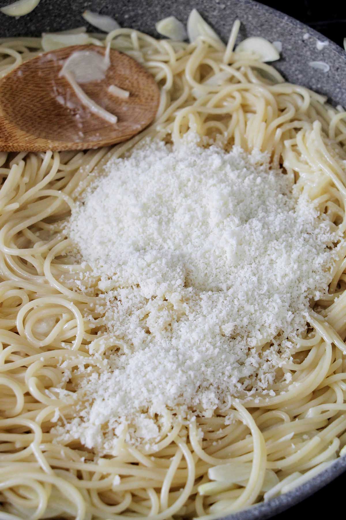 parmesan cheese on spaghetti.