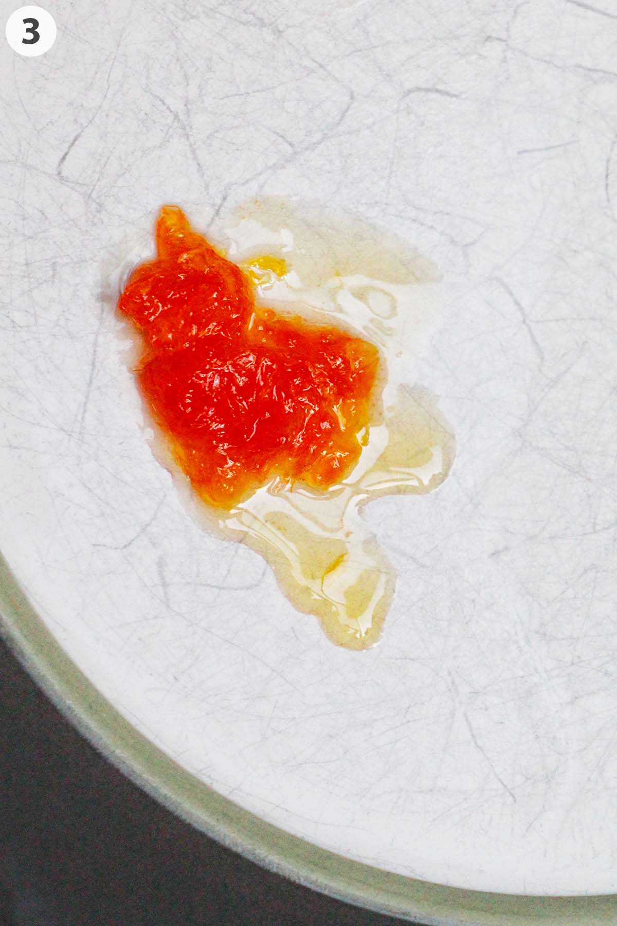 numbered photo with stiff jam on a plate.